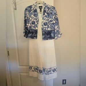 Positive Attitude 2-piece midi skirt amd 3/4 sleeve jacket.